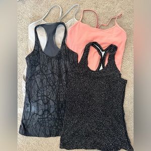 Lot of Four Lululemon Tanks, Size 8